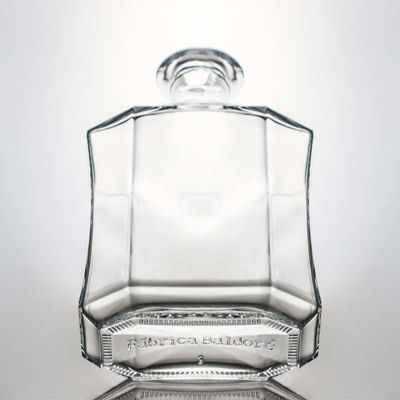 Bottiglia di liquore in vetro poligonale unica e trasparente o personalizzata per whisky gin rum vodka 1000 ml