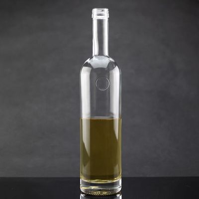 Bottiglie di imballaggio di olio d'oliva a colletto di vetro con disegno poligonale e chiusura del tappo di sughero