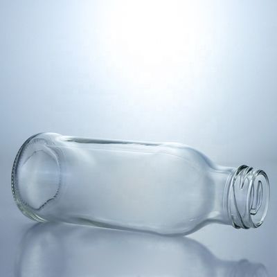 Bottiglia di bevande in vetro trasparente Popolare 100ml260ml 500ml 1000ml Bottiglia rotonda con tappo a vite