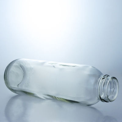 Materiale del colletto Vetro 350ml Bottiglia di vetro a forma rotonda con tappo a vite con logo personalizzato unico