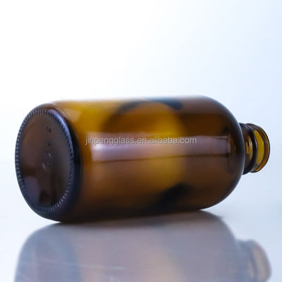 Bottiglia di birra di vetro vuota da 350 ml con tappo di seta a corona e stampaggio a caldo