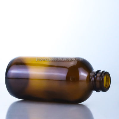 Bottiglia di birra di vetro vuota da 350 ml con tappo di seta a corona e stampaggio a caldo