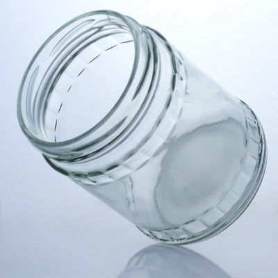 Vaso di vetro a pietra rotonda trasparente per la produzione e la distribuzione di prodotti alimentari