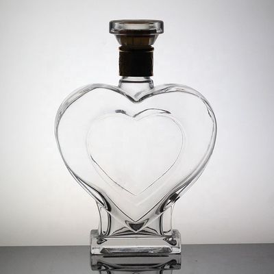 Bottiglia di vetro a forma di cuore su misura con tappo e coperchio a corona