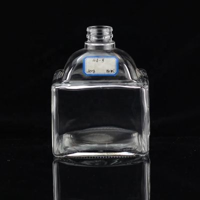 Bottiglia di vetro industriale da 700 ml per l'industria delle bevande a forma di pollice