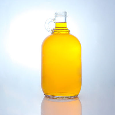Logo personalizzato Bottiglia di vetro di liquore a forma rotonda con manico e tappo a vite