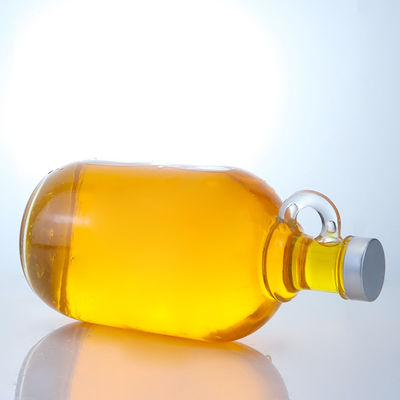 Logo personalizzato Bottiglia di vetro di liquore a forma rotonda con manico e tappo a vite