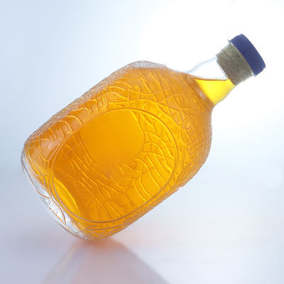 Unica forma rotonda in rilievo rum di qualità alimentare vodka whisky tequila gin bottiglia di vetro con sughero perfetto