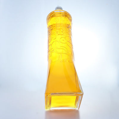 Bottiglia di vetro per liquori industriali con forma unica e materiale in rilievo super-frittone
