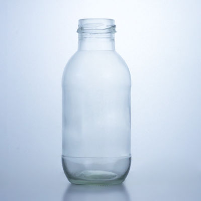 300 ml Bottiglia rotonda di latte in vetro con coperchio Soluzione di conservazione liquori Manipolazione della superficie deccale