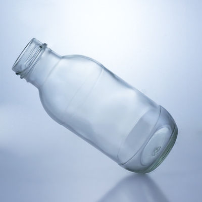 300 ml Bottiglia rotonda di latte in vetro con coperchio Soluzione di conservazione liquori Manipolazione della superficie deccale
