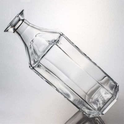Bottiglia di liquore in vetro poligonale unica e trasparente o personalizzata per whisky gin rum vodka 1000 ml