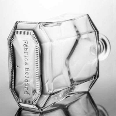 Bottiglia di liquore in vetro poligonale unica e trasparente o personalizzata per whisky gin rum vodka 1000 ml