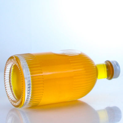 Bottiglia di vetro per liquori industriali con strisce di tappo a vite e logo personalizzato