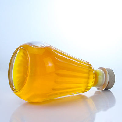 Bottiglia di vetro rotonda con tappo di sughero e logo personalizzato per rum vodka whisky tequila gin