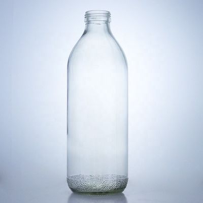 Bottiglie di vetro trasparenti da 1020 ml con tappo a vite e forma unica