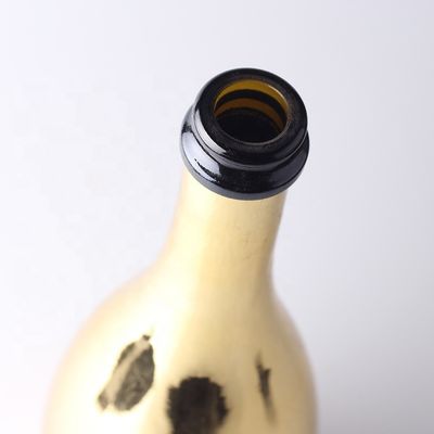 Bottiglie di vetro di champagne d'oro personalizzate con tappo di plastica per materiali di corpo in vetro